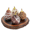 Chocolate Dipped Pears, four chocolate-dipped pears adorned with assorted toppings, live edge serving board, Gourmet Gifts from Blooms New Jersey - Same Day New Jersey Delivery.