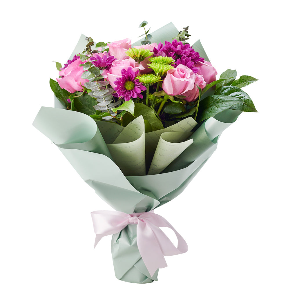 Mother's Day Secret Garden Mixed Floral Bouquet, roses, daisies, eucalyptus, and salal gathered in a floral wrap and tied with designer ribbon, Mixed Floral Gifts from Blooms New Jersey - Same Day New Jersey Delivery.