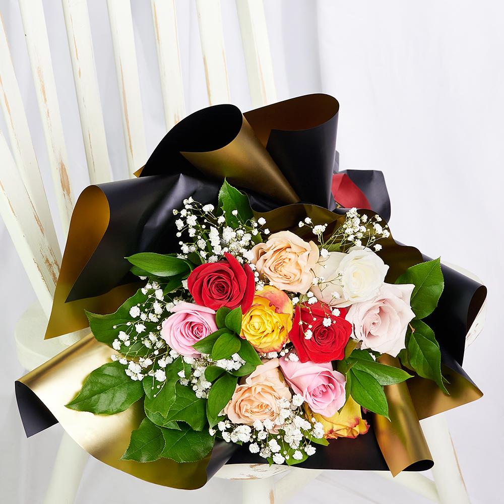 Enduring Charm Rose Bouquet, roses in a variety of colours along with baby’s breath in a floral wrap and tied with designer ribbon, Mixed Floral Gifts from Blooms New Jersey - Same Day New Jersey Delivery.