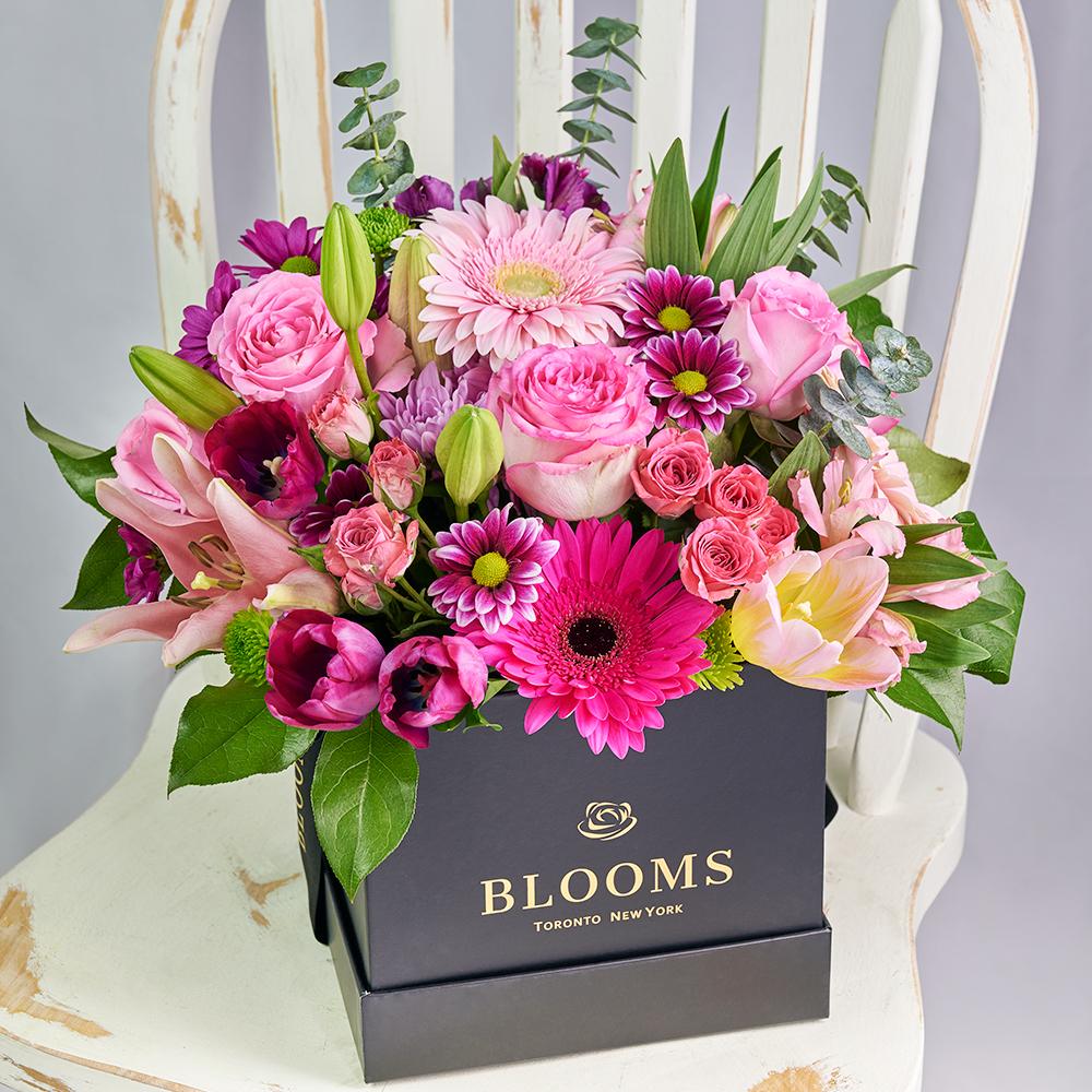 Mother's Day Select Floral Gift Box, all pink lilies, roses, tulips, alstroemeria, gerbera, and daisies presented in a black designer square hat box, Mixed Floral Gifts from Blooms New Jersey - Same Day New Jersey Delivery.