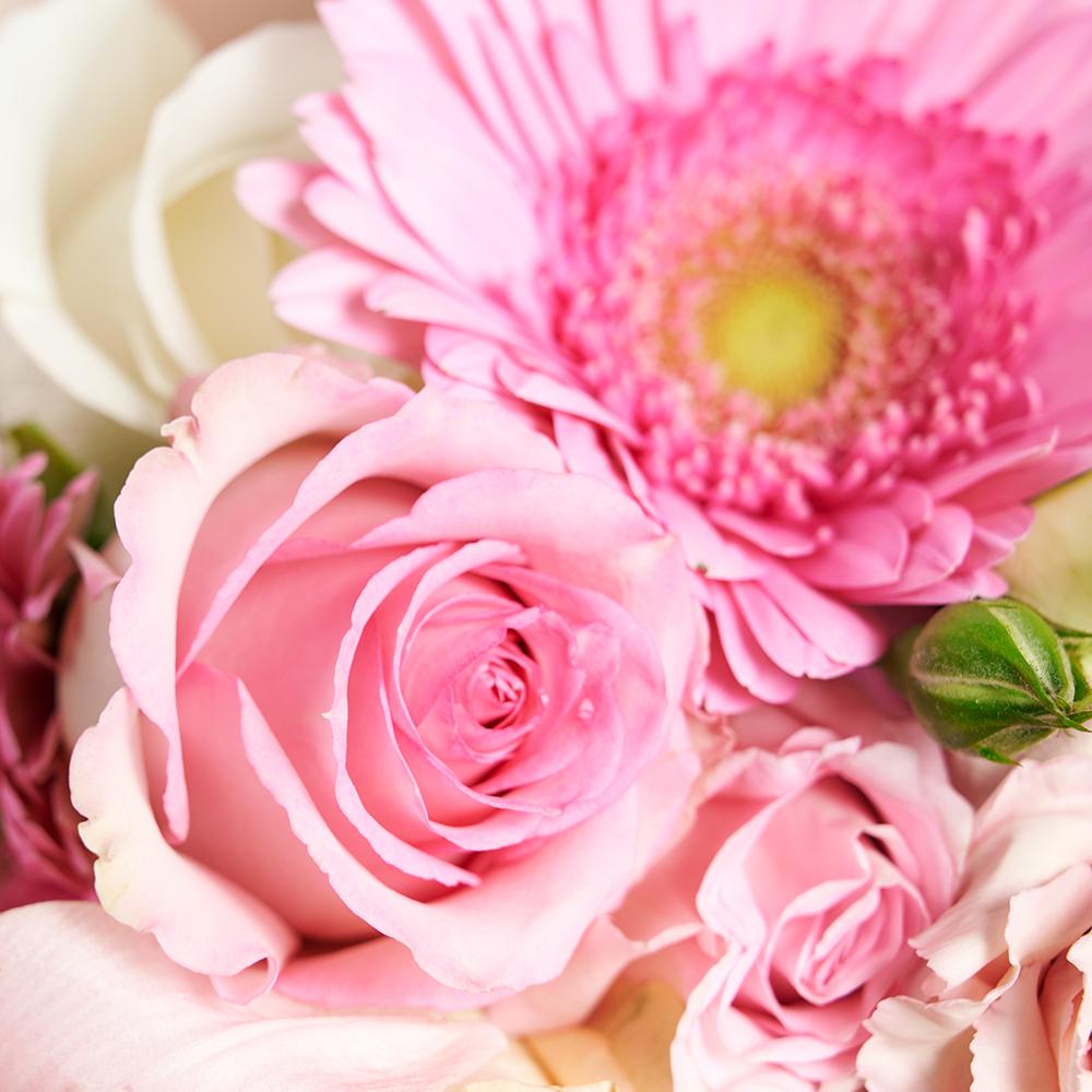 Pastel Pink Variety Bouquet, pastel roses, spray roses, lilies, gerbera, carnations, and eucalyptus in a floral wrap and tied with designer ribbon, Mixed Floral Gifts from Blooms New Jersey - Same Day New Jersey Delivery.