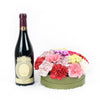 Carnation hat box flower arrangement with a bottle of Wine. Take Me To Versailles Flowers & Wine Gift - New Jersey Blooms - New Jersey Flower Delivery