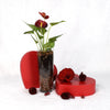 Valentine's Day Statement Red Anthurium, potted anthurium, planted in a tall, classic glass vase standing around 12 inches tall, Plant Gifts from Blooms New Jersey - Same Day New Jersey Delivery.