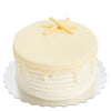 White Chocolate Cake, adorned with the smoothest, silkiest, and utterly mouth-watering frosting, Cake Gifts from Blooms New Jersey - Same Day New Jersey Delivery.