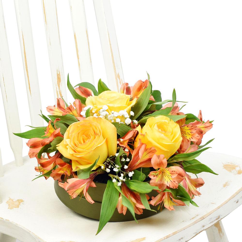Autumnal Sunset Arrangement, brightly colored roses and alstroemeria, complemented by baby’s breath in a short green designer hat box, Mixed Floral Gifts from Blooms New Jersey - Same Day New Jersey Delivery.