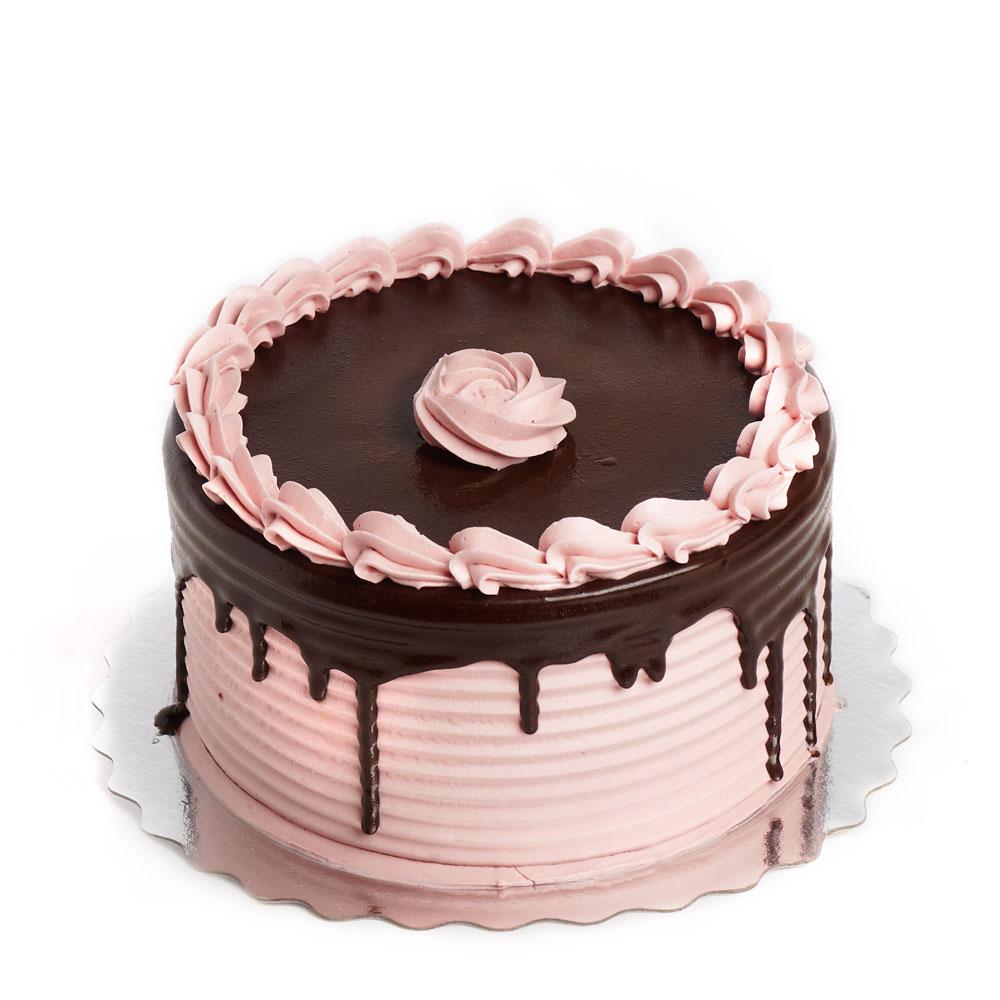 Blood Sweat & Crumbs - Pink chocolate drip cake. Chocolate cake layered  with pink vanilla buttercream topped with dark chocolate ganache and a  selection of chocolates. #cake #chocolatecake #chocolate #vanilla  #buttercream #pink #
