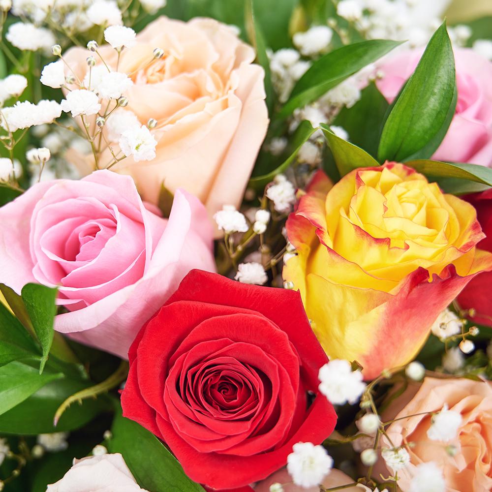 Enduring Charm Rose Bouquet, roses in a variety of colours along with baby’s breath in a floral wrap and tied with designer ribbon, Mixed Floral Gifts from Blooms New Jersey - Same Day New Jersey Delivery.