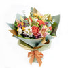 Mother's Day Love In Casablanca Deluxe Mixed Rose Bouquet, roses, lilies, daisies, spray roses, and spider mums along with eucalyptus and salal gathered in a floral wrap and tied with a designer ribbon, Mixed Floral Gifts from Blooms New Jersey - Same Day New Jersey Delivery.