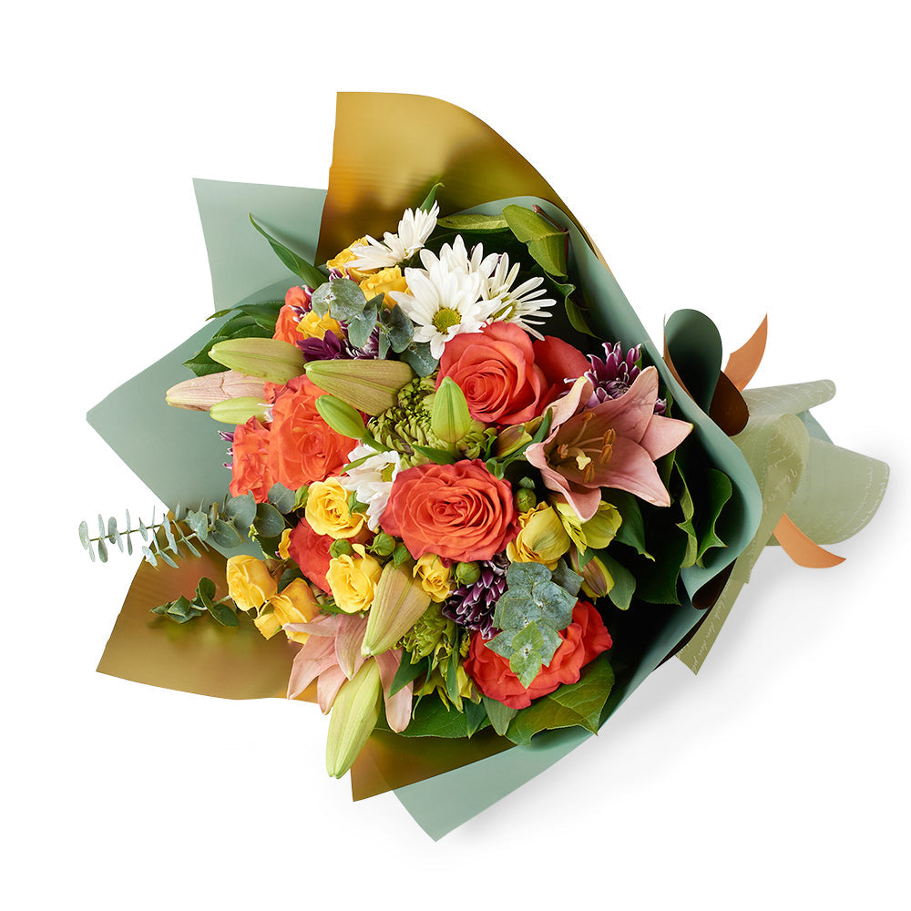 Mother's Day Love In Casablanca Deluxe Mixed Rose Bouquet, roses, lilies, daisies, spray roses, and spider mums along with eucalyptus and salal gathered in a floral wrap and tied with a designer ribbon, Mixed Floral Gifts from Blooms New Jersey - Same Day New Jersey Delivery.