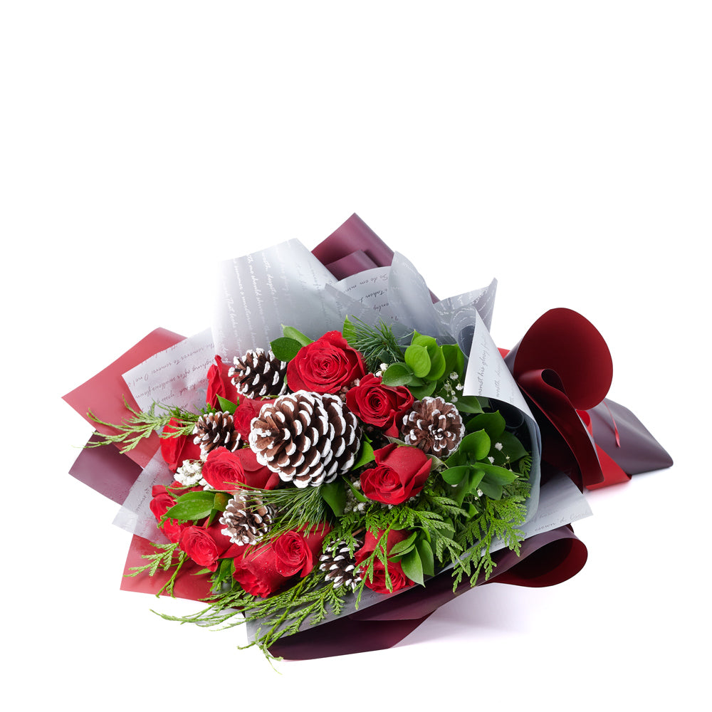 Winter Rose Bouquet, roses, pine cones, baby’s breath, and greens in a floral wrap and tied with a beautiful designer ribbon, mixed flower gifts from Blooms New Jersey - Same Day New Jersey Delivery.