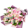 Pastel Pink Variety Bouquet, pastel roses, spray roses, lilies, gerbera, carnations, and eucalyptus in a floral wrap and tied with designer ribbon, Mixed Floral Gifts from Blooms New Jersey - Same Day New Jersey Delivery.