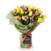 Spring Radiance Mixed Bouquet, beautiful blend of alstroemeria and tulips in a floral wrap with designer ribbon, Flower Gifts from Blooms New Jersey - Same Day New Jersey Delivery.