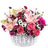 Suddenly Spring Mother’s Day Floral Gift, roses, daisies, lilies, gerbera, and greens in a charming white wicker basket, Floral Gifts from Blooms New Jersey - Same Day New Jersey Delivery.