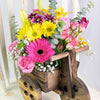 Mother's Day Floral Wooden Cart, daisies, gerbera, lilies, roses, spray roses, baby’s breath, and eucalyptus in a wooden cart planter, Mixed Floral Gifts from Blooms New Jersey - Same Day New Jersey Delivery.