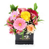 Touch of Spring Box Arrangement, alstroemeria, baby’s breath, gerberas, roses and ruscus arranged in an elegant black hat box, Mixed Floral Gifts from Blooms New Jersey - Same Day New Jersey Delivery.