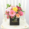 Touch of Spring Box Arrangement, alstroemeria, baby’s breath, gerberas, roses and ruscus arranged in an elegant black hat box, Mixed Floral Gifts from Blooms New Jersey - Same Day New Jersey Delivery.