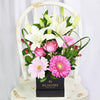 Vivid Mixed Floral Arrangement, vibrant roses, lilies, gerbera, and hypericum berries arranged in a black designer hat box, Mixed Floral Gifts from Blooms New Jersey - Same Day New Jersey Delivery.