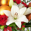 Joyous Christmas Floral Arrangement, roses, lilies, chrysanthemums, berries, greenery, pine cones, ornaments, and a Christmas decoration all arranged artfully into a ceramic pot, mixed flower gifts from Blooms New Jersey - Same Day New Jersey Delivery.